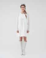 Model wearing an off-white lace Maria Lily Mini Dress with silk satin details and mini sequins embroidery, complemented by a colorful Lemon Headband and white knee-high boots